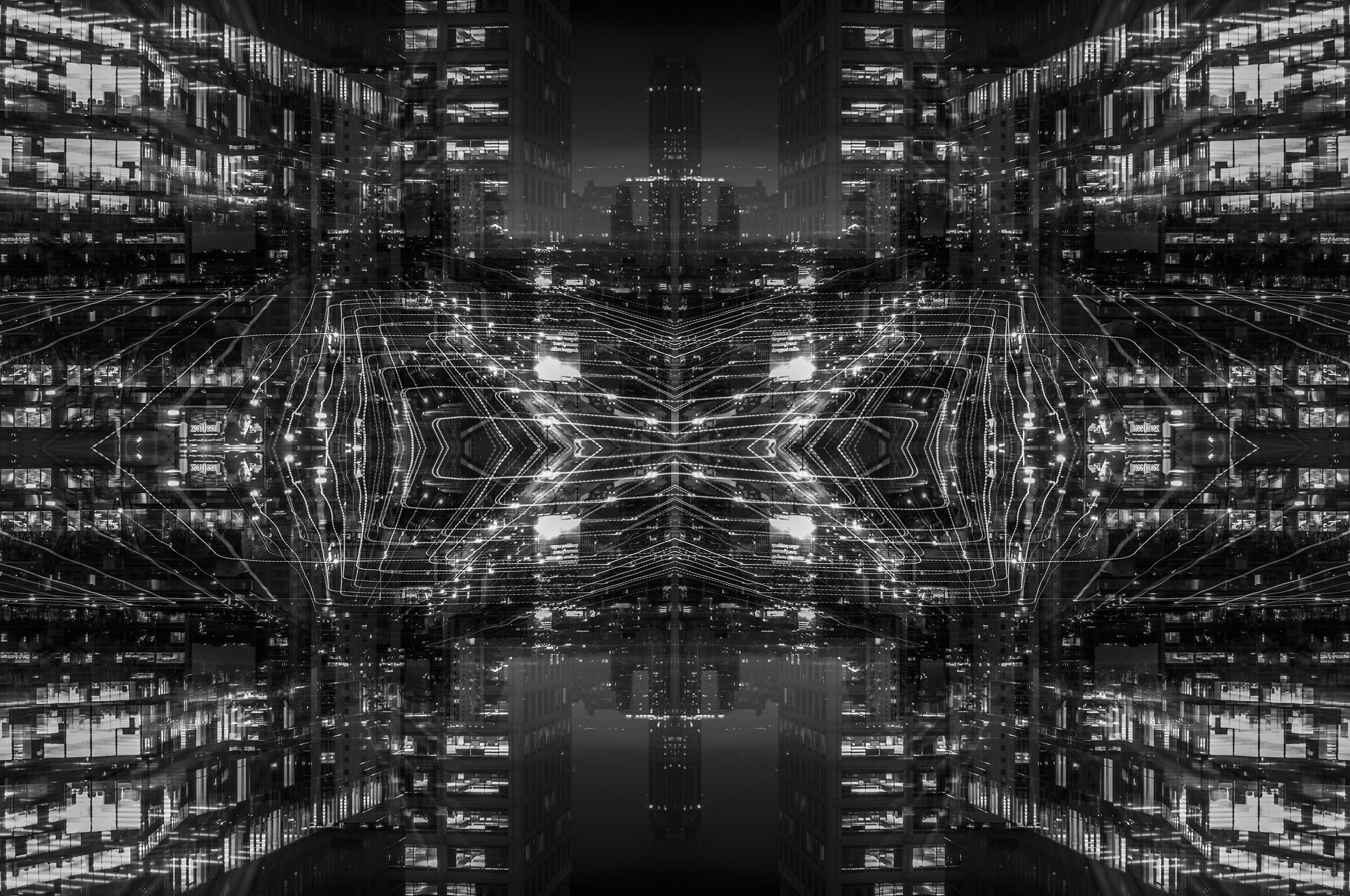 Symmetric construction of Chicago towers forming a city within a city, built from a long-exposure photograph