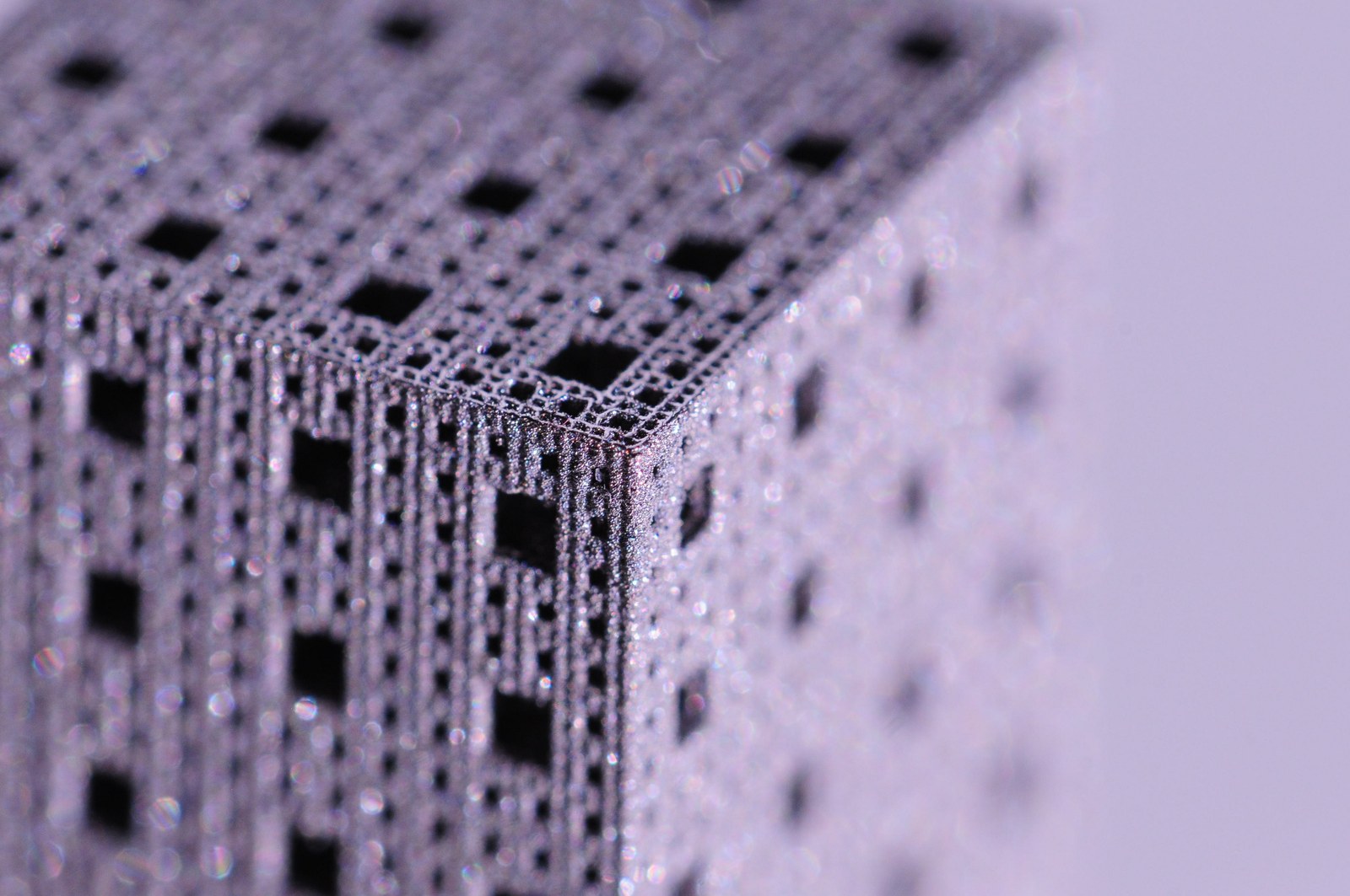 Tall triple-porosity 3D-printed Ti-6Al-4V lattice for bone scaffolds, oblique macro view
